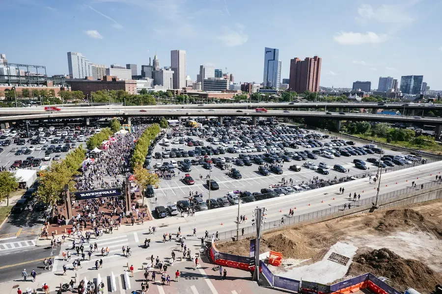 m&t bank stadium parking lot filled with cars and people